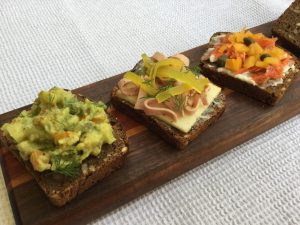 three slices of bread with toppings