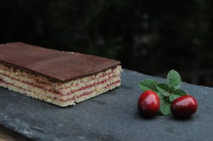 layered cookie on cutting board