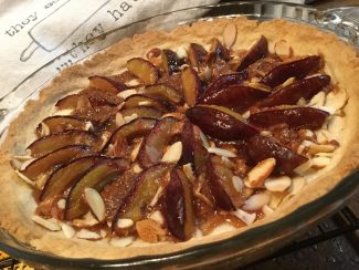 plum cake with marzipan and almonds in the cakepan