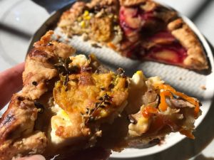 plum and savory galette on plate