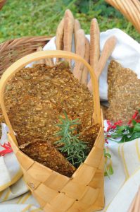 rye seed crackers in the basket + bread sticks
