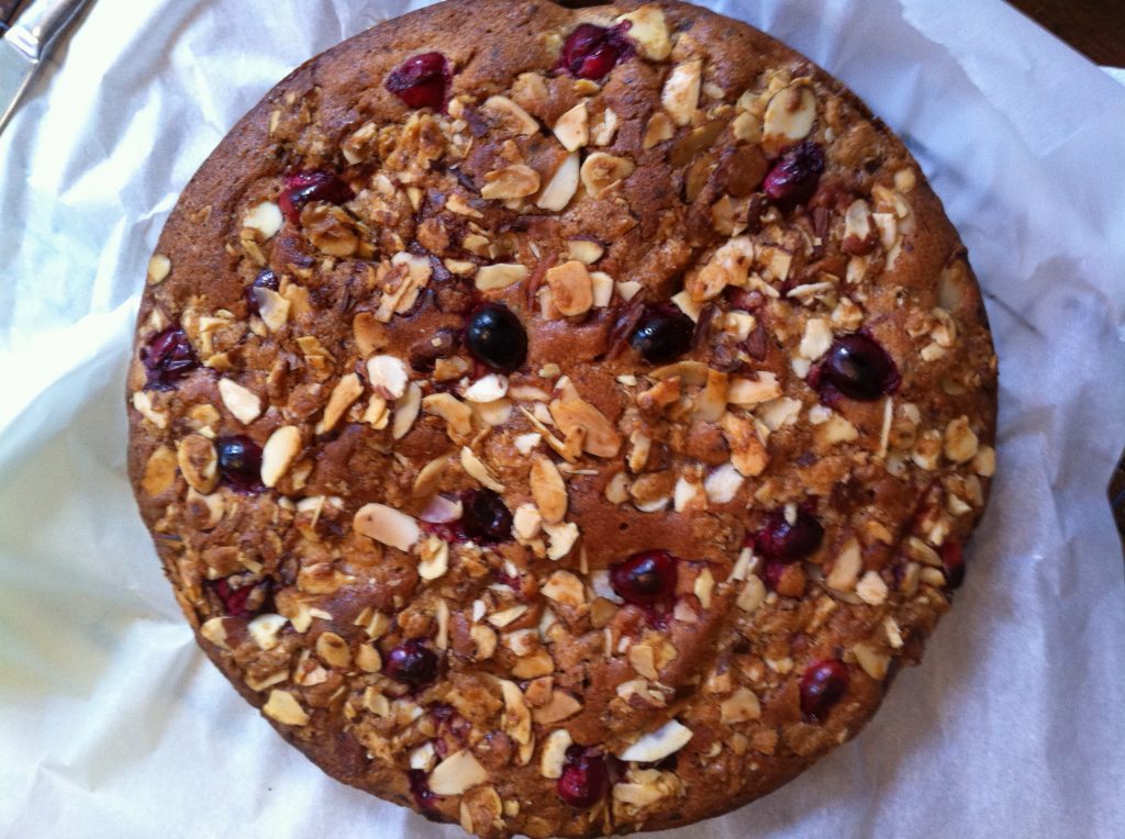 Round speltcake with cranberries and almonds